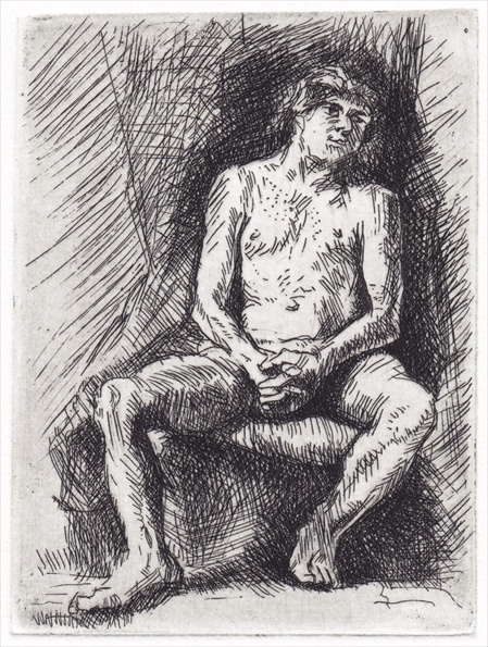 Man seated before a curtain